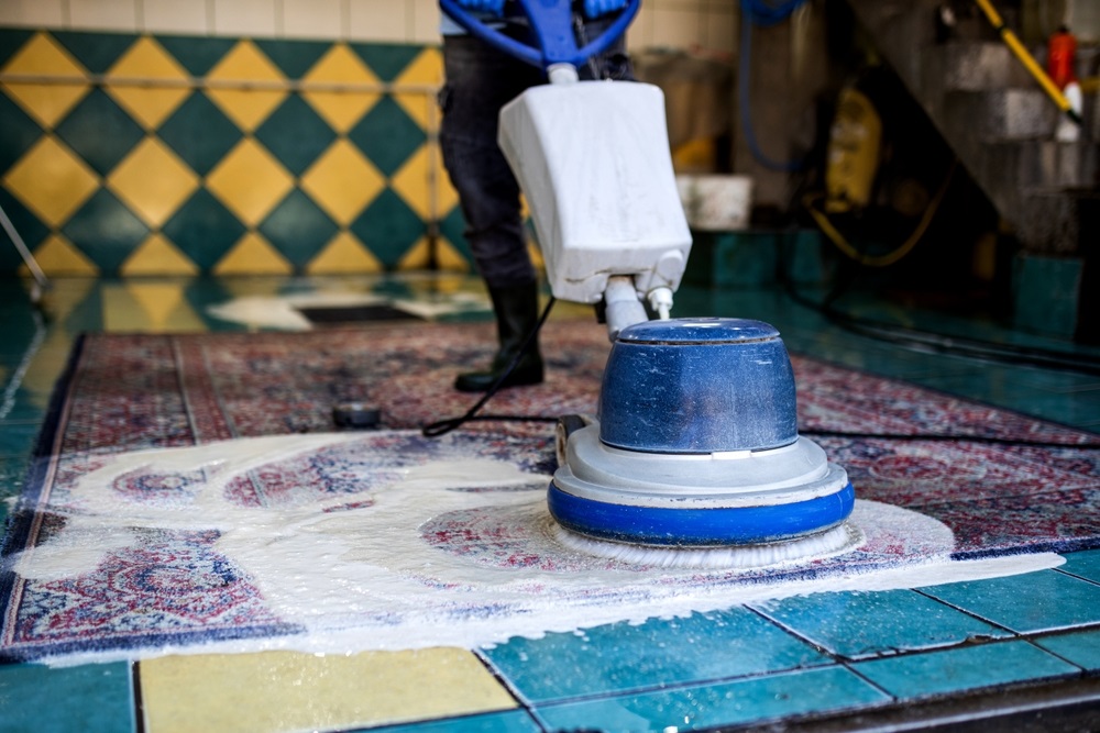 A careful cleaning process of a wool rug, highlighting the gentle washing and drying technique.