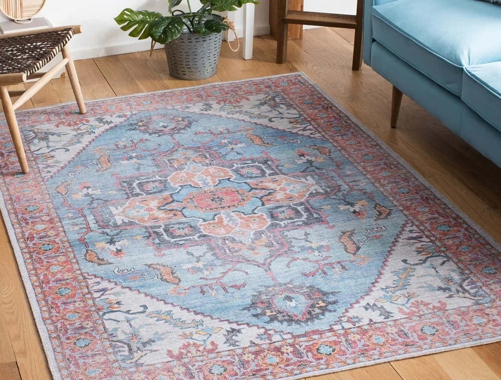 How to clean an area rug without moving it using home methods like vacuuming and spot cleaning.