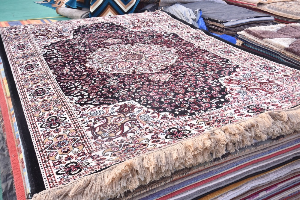 Instructions on how to clean a silk rug gently and carefully to maintain its beauty.